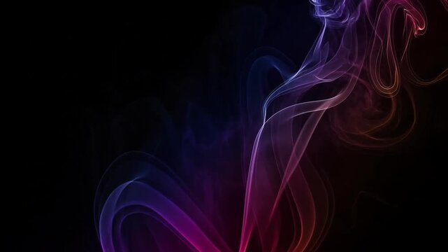 Colorful smoke swirling on black background.
