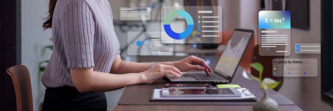 Woman analyst working on laptop with virtual screen interface displaying data analytics charts and scientific formulas for innovative project development and research