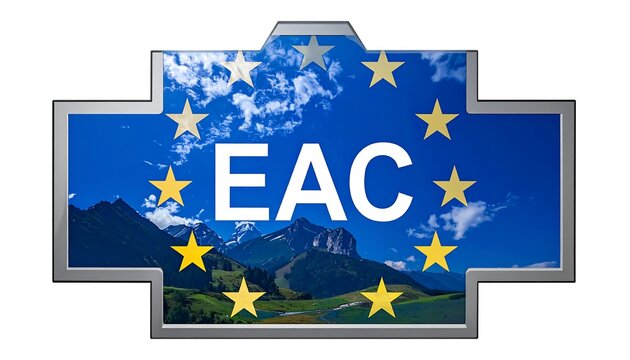 A crest-shaped emblem with a mountainous landscape behind the letters "EAC". A ring of gold stars surrounds the scene