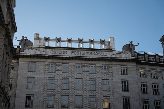 Vienna, Austria- Feb 21, 2026: The historic building of &Ouml;sterreichische Postsparkasse features unique architectural design with a distinct facade and decorative elements under a clear blue sky.