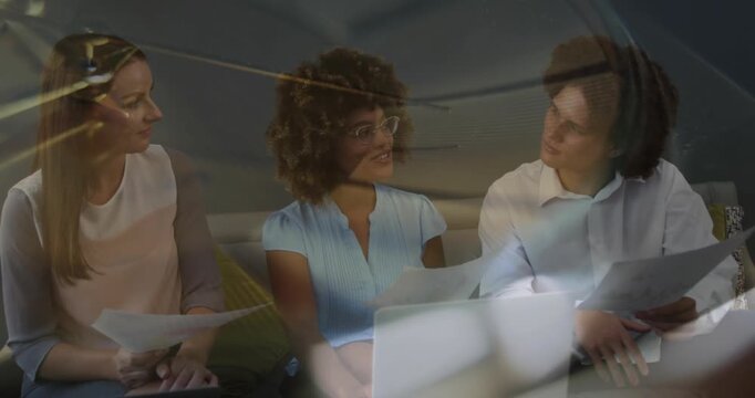 Composite video of close up of ticking clock against diverse businesspeople discussing at office