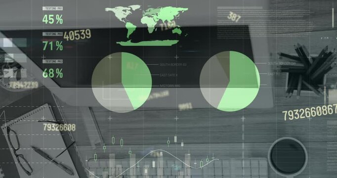 Animation of statistical data processing and changing numbers over office equipment on wooden table