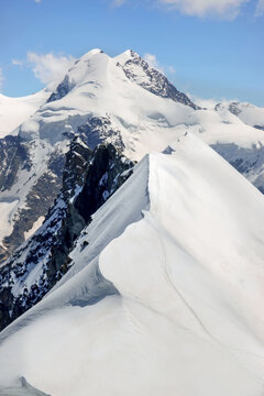 Snow ridge on Lyskamm peak, Monte Rosa massif, Swiss Alps mountain landscape