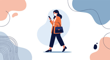 Fototapeta premium Professional woman wearing a face mask walks and uses her smartphone while carrying a handbag against a modern abstract background.