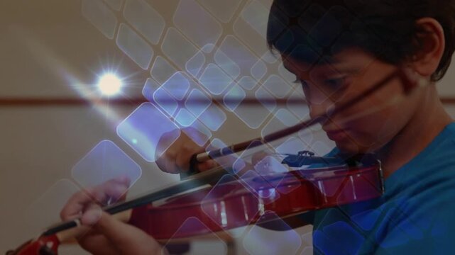 Spot of light and square shapes against close up of caucasian boy playing a violin