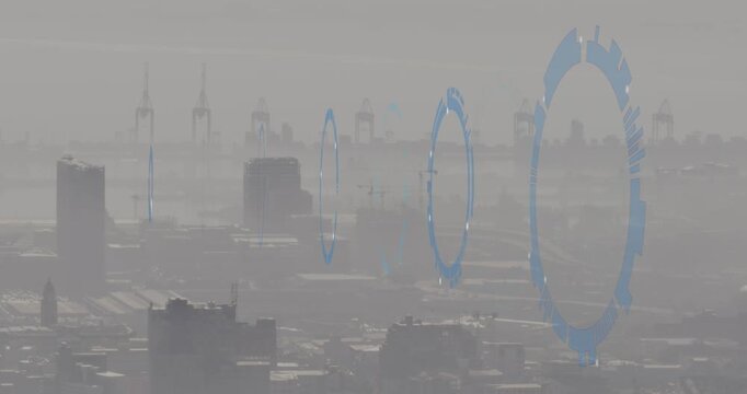 Animation of multiple round scanners spinning against aerial view of cityscape
