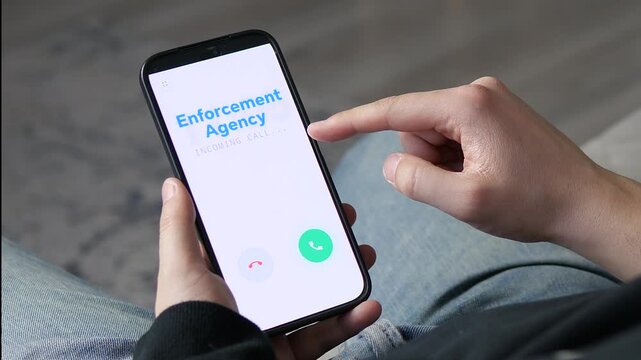 Incoming call from Enforcement Agency on a smartphone screen. Man hesitates to answer. Perfect for legal advice, fraud prevention, and law enforcement news. High-quality concept for security, justice