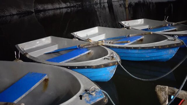 Turda, Romania The inside cavern of the landmark Turda Salt Mine and row boats in a lake. 