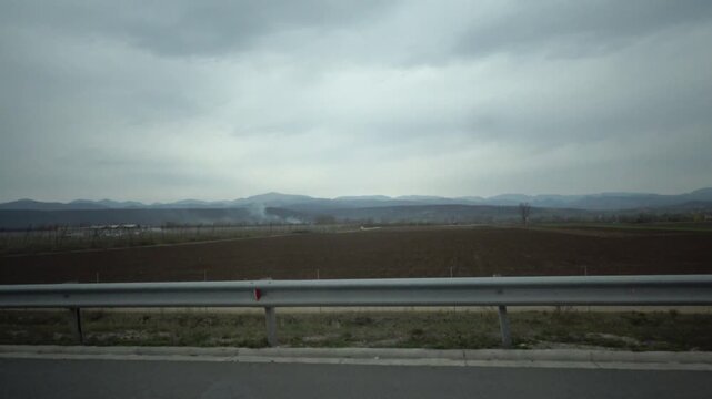 Turda, Romania The landscape of central Romania seen from a moving car. 