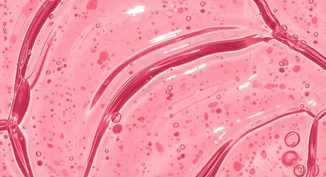 Close-up abstract texture of pink liquid soap or gel