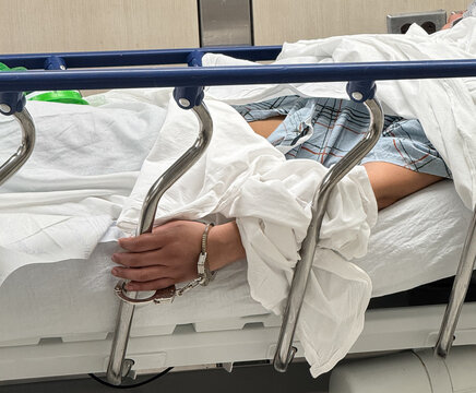 hospital patient handcuffed