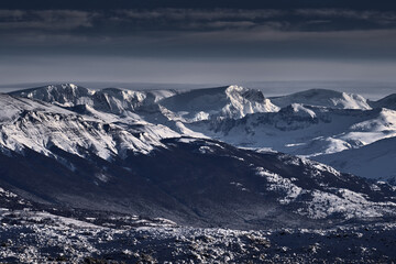 Winter twilight lanscape from Patagonia moutains with snow. Lago Nordenskjold, Torres del Paine National Park, Chile. Pink blue evening sky. Traveling in Chile,  hills. © ondrejprosicky