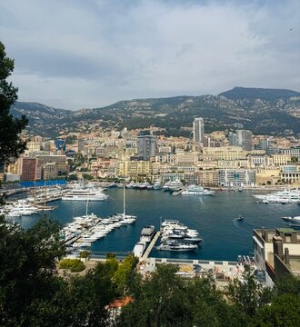 Aerial view of port Hercules in Monaco - Monte-Carlo at sunny day, a lot of yachts and boats are moored in marina, mediterranean sea