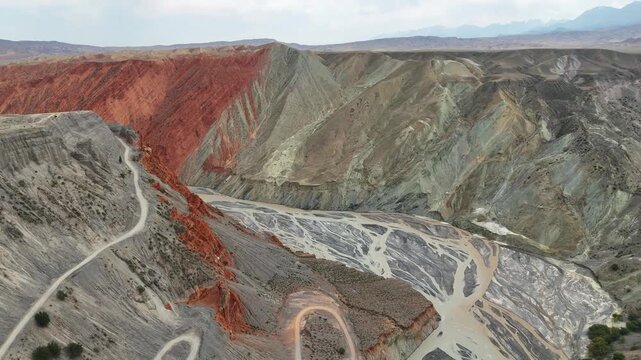  Aerial Push-in Shot of the Colorful Anjihai Grand Canyon in Summer, Xinjiang, China