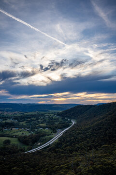 Plane trail in the sunset sky Hassan's wall, Lithgow