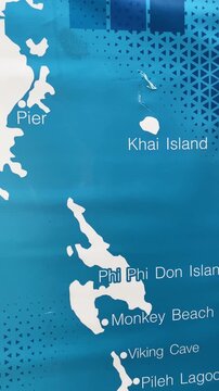 Tourist map of island boat trips around Phuket Thailand on a screen, vertical video of travel planning concept.