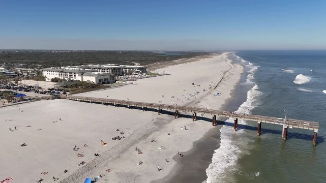 Aerial view overlooking St Augustine beach pier near Anastasia State Park in St Augustine, Florida.