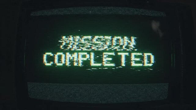 Medium shot. Old computer terminal displaying 'MISSION COMPLETED'. Analog CRT glitches and scanlines. Vintage video game end screen.