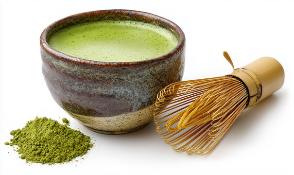 A cup of matcha tea with bamboo whisk, isolated on white.