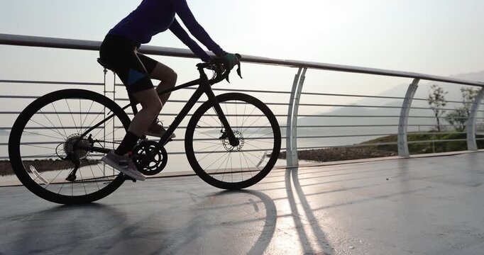 Riding bike on seaside road