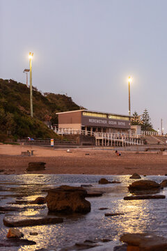 Merewether Ocean Baths building on coast at dusk