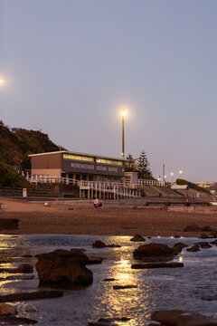 Merewether Ocean Baths building on coast at dusk