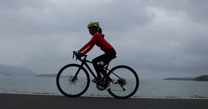 Riding bike on seaside road