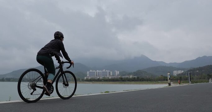 Riding bike on seaside road