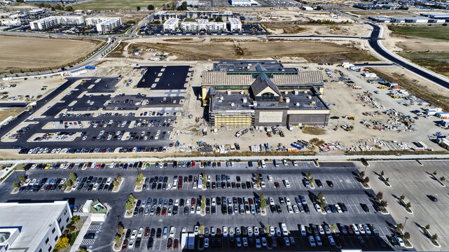 Aerial View of Big Box Retail Store Under Construction with Surrounding Parking Lot