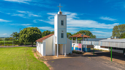 Naklejka premium Historic San Sebastian Catholic Church in Monte Belo rural district, Nova Alianca, Sao Paulo, Brazil. Traditional colonial style chapel in small Brazilian town, countryside landmark.