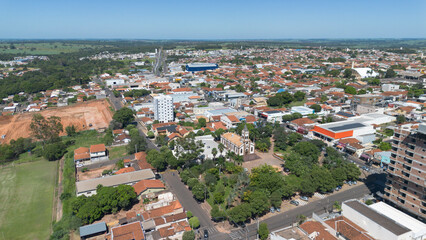 Fototapeta premium Aerial drone view of Bady Bassitt city in Sao Paulo state, Brazil. Residential neighborhoods, urban development and expansion of a small Brazilian town in the countryside