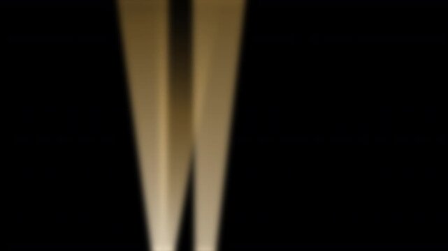 three art deco searchlight beams of light rays isolated on a black background moving through the night time sky like an wartime blitz air raid or a backdrop to a movie premiere or awards evening 4K 