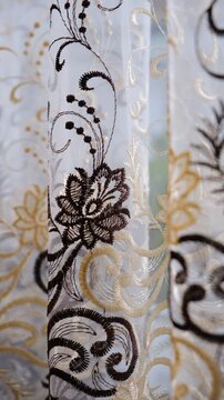 White fishnet cloth material, black golden pattern, guipure, texture background. Luxurious background design. Art Deco. Elegance and grace . Evening Gown. Elegance mesh tulle fabric. 