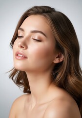Naklejka premium Beautiful young woman with closed eyes and soft makeup, showcasing flawless skin and healthy hair against a neutral background, representing beauty and self-care