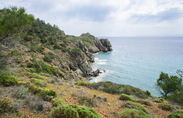 Fototapeta premium Rocky Seaside Cliffs and Turquoise Water Landscape