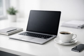 Fototapeta premium Laptop and coffee cup on table in cozy home workspace