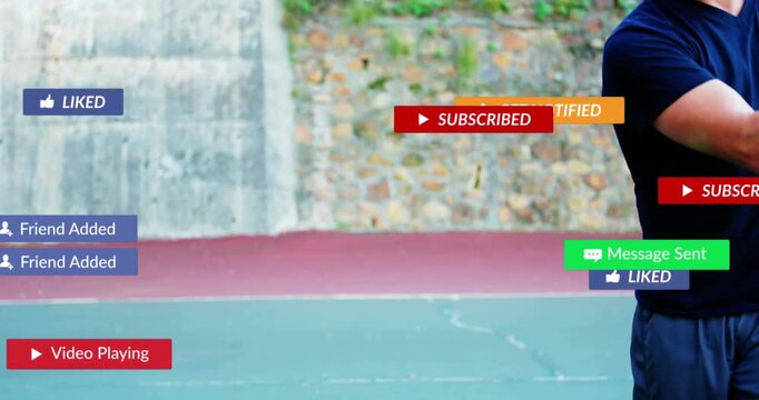 Mature man practicing on court, swinging racket and creating social media subs and liked alerts