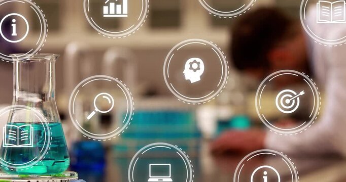 Scientist leaning over taking notes while animated icons appearing over flask visualizing lab data