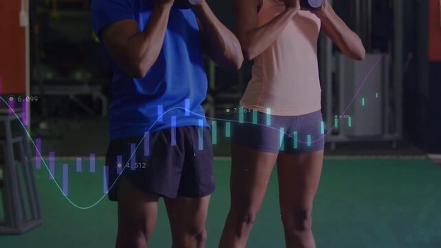 Man and woman partners performing squats on turf, camera pulling back while charts tracking fitness