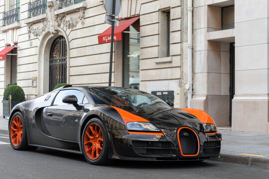 Paris, France - February 5th 2019 : View on a black and orange Bugatti Veyron 16.4 Grand Sport Vitesse WRC finished in Black Carbon Fiber and Arancia Mira parked on a street.