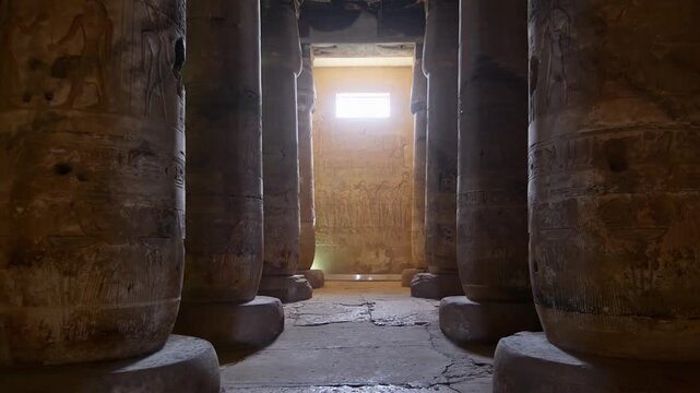 Ancient hall of the Abydos Temple with towering columns and intricate hieroglyphs, showcasing the spiritual depth and architectural mastery of Ancient Egypt.