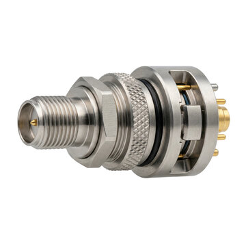 Precision metal RF connector showing quantum computing components and polished contacts in studio closeup conveying technical focus and cool mood