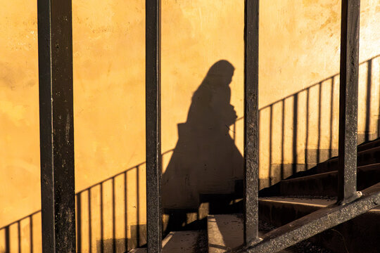 Stockholm, Sweden The shadow of a woman walking up the stairs.