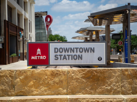 Metro Downtown Station Sign Outside of Building in Downtown Austin, Texas