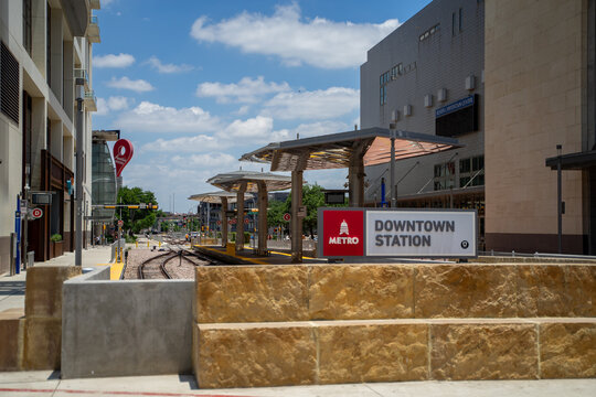 Metro Downtown Station Sign Outside of Building in Downtown Austin, Texas