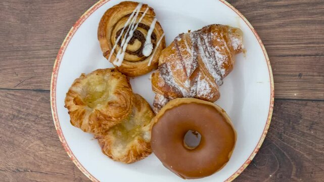 Rotating Plate of Sweet Pastries, Danishes and Donuts