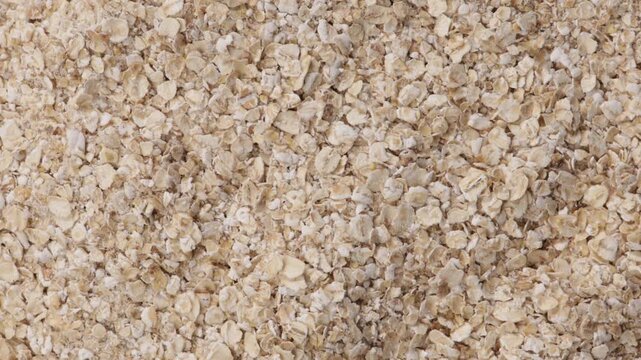 uncooked oats flakes top view zoom food