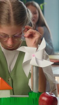 Sad bullied Caucasian school girl making stop gesture hand indoor classroom upset child student suffer bullying taking off glasses frustrated teen schoolgirl mocking classmates pupils education stress