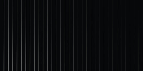 Vertical metal slats forming a modern architectural facade under dim lighting © ANTU