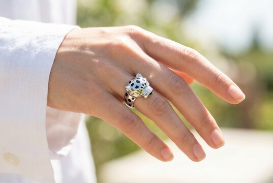 Bague or blanc forme de guepard